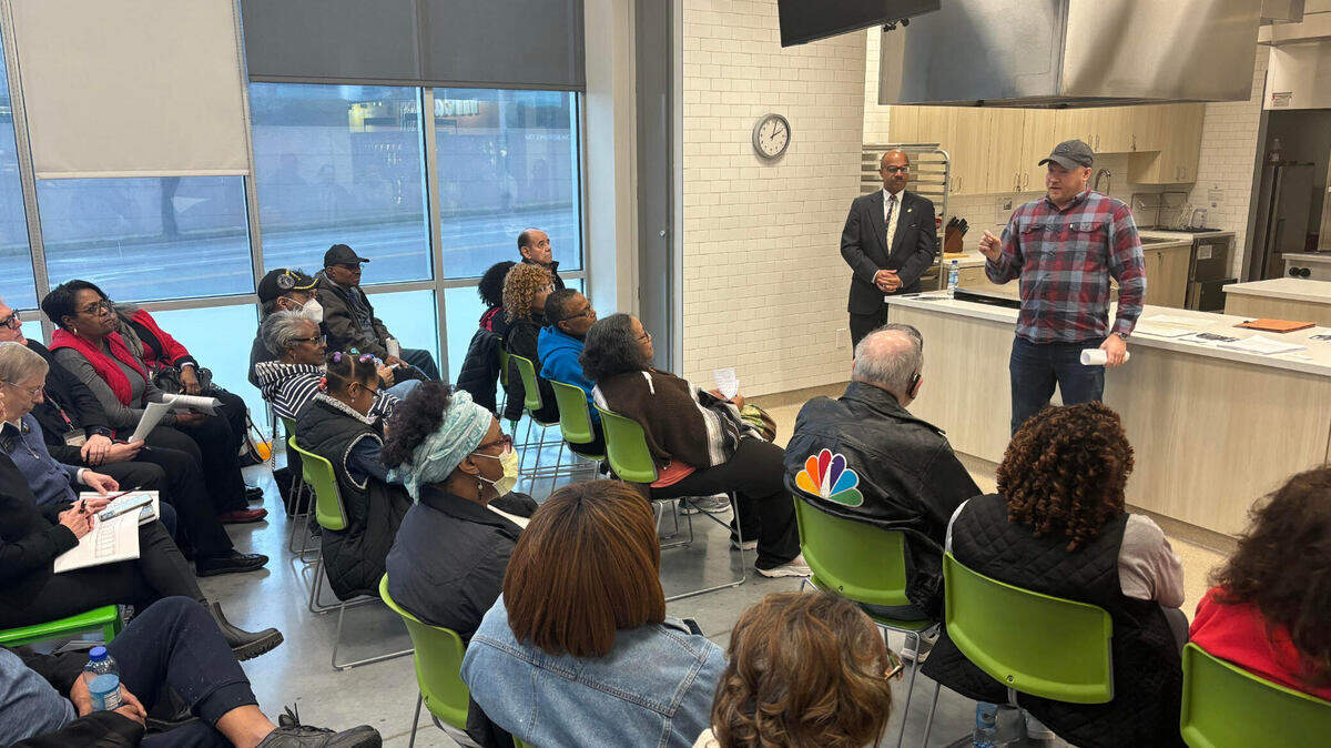 Will Lawrence, Gov. Laura Kelly’s chief of staff, urges opposition to a Republican-led tax plan during a town hall called by Sen. David Haley on Saturday.