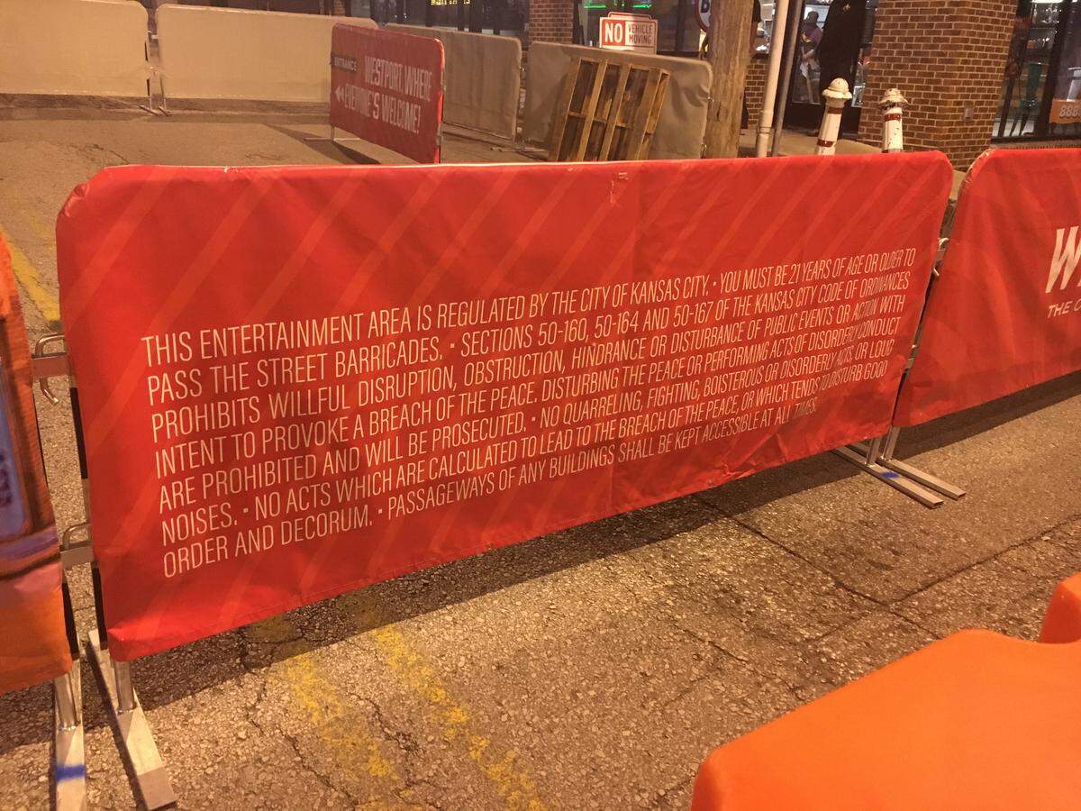 Covering some of the metal barriers on the roadway in Westport were messages informing guests that the area is regulated by the city, also adding visitors “must be 21 years of age or older to pass the street barricades.”