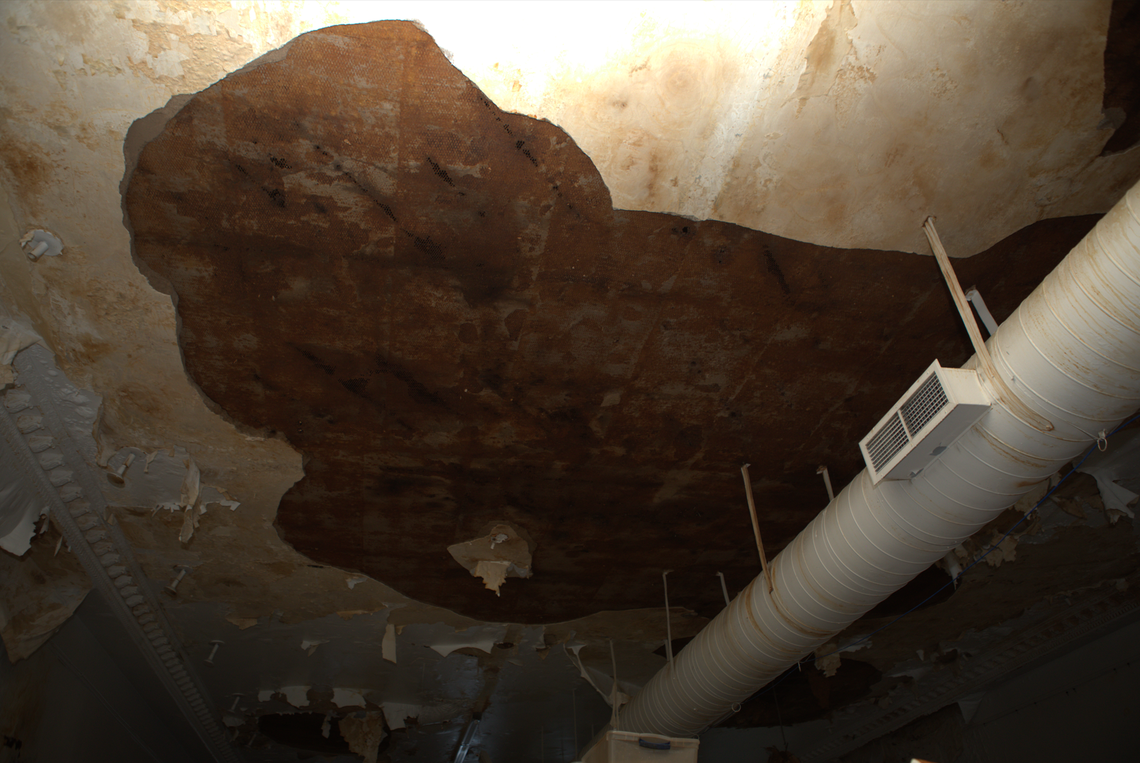 Ceiling damage seen inside the former home of Clint’s Comics in Westport. The city has declared the building to be dangerous.