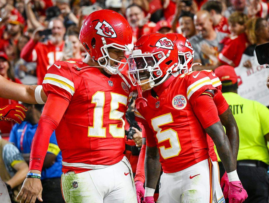 Kansas City Chiefs quarterback Patrick Mahomes (15) celebrates with wide receiver Hollywood Brown (5) after Brown scored a touchdown in the fourth quarter against the Detroit Lions on Sunday, Oct. 12, 2025, at GEHA Field at Arrowhead Stadium.