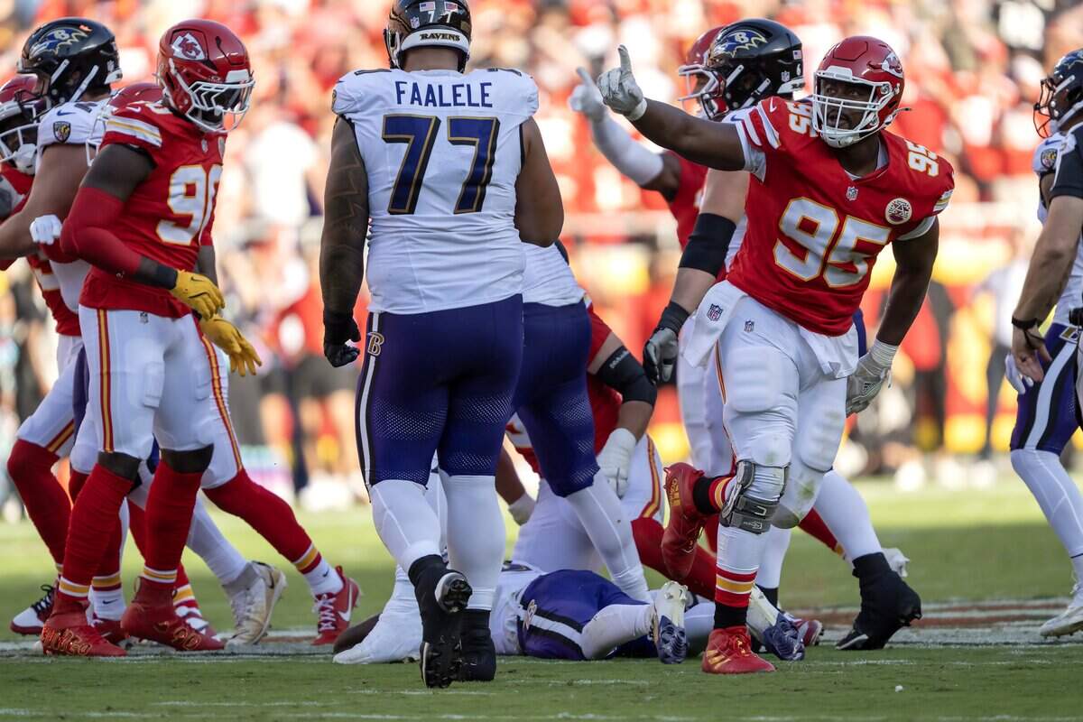 Kansas City Chiefs defensive end Chris Jones (95) celebrates a sack of Baltimore Ravens quarterback Lamar Jackson (8) in the first half at GEHA Field at Arrowhead Stadium on Sunday, Sept. 28, 2025, in Kansas City.
