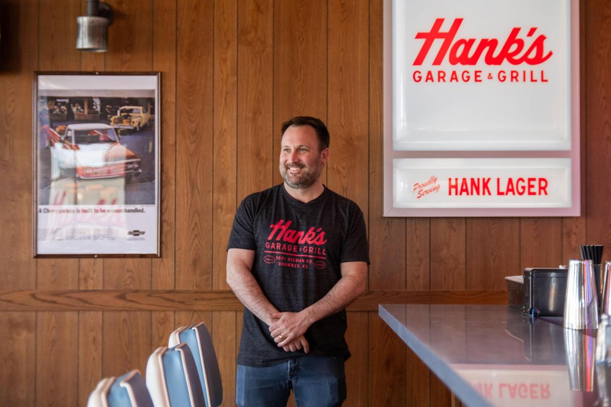 Eric Flanagan, owner of Hank’s Garage and Grill in Shawnee, named his latest venture after a family member. It features several nods to classic car culture and vintage diner vibes.