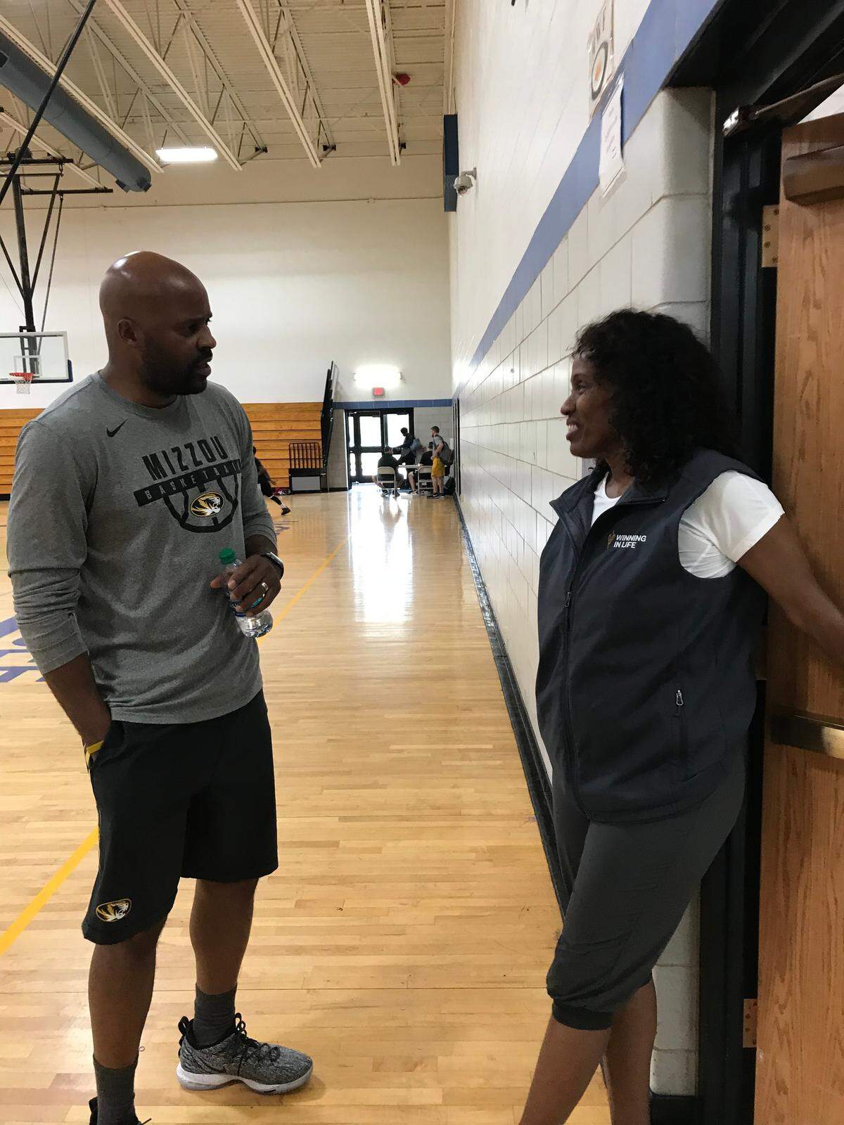 Olympic great Jackie Joyner-Kersee chats with Missouri men’s basketball coach Cuonzo Martin at the Jackie Joyner-Kersee Center in East St. Louis.