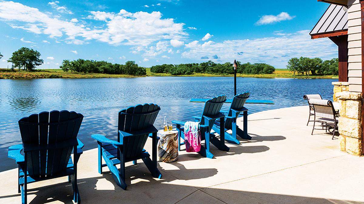 Deanna and Greg Graves built a guest cottage on a private lake in Drexel, Mo. Their second home is under construction nearby.