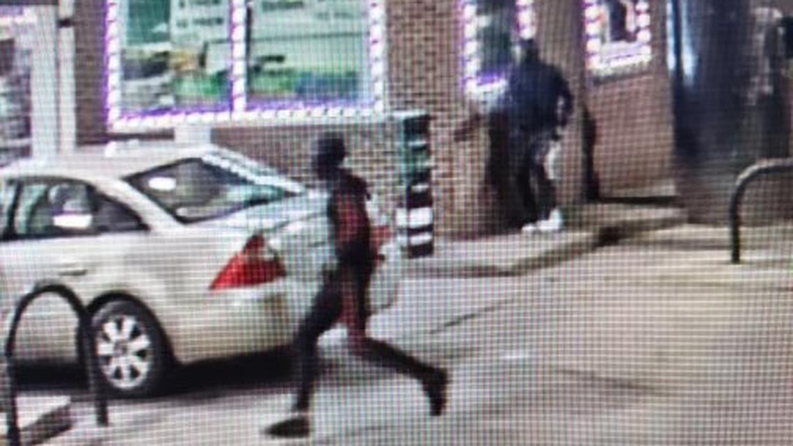 Surveillance image from a double fatal shooting at the Marathon Gas Station in Detroit. Police are looking for two shooters.