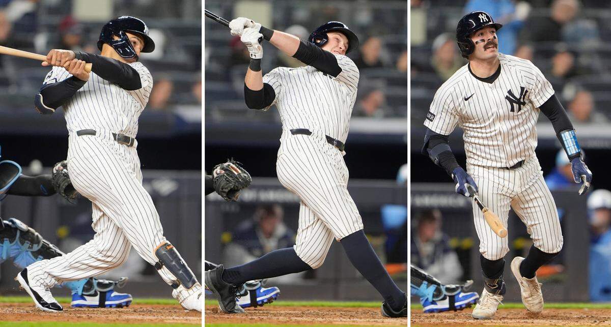 Yankees sluggers Trent Grisham (from left), Ben Rice and Austin Wells all homered off Kansas City Royals pitcher Seth Lugo during the fifth inning of a Monday, April 14, 2025 Major League Baseball game at Yankee Stadium in New York. Jazz Chisholm (not pictured) homered off Lugo in the fourth. All four home runs were solo shots.