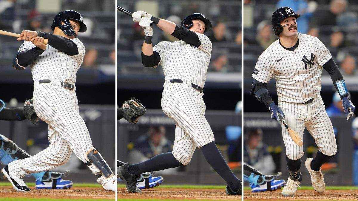 Yankees sluggers Trent Grisham (from left), Ben Rice and Austin Wells all homered off Kansas City Royals pitcher Seth Lugo during the fifth inning of a Monday, April 14, 2025 Major League Baseball game at Yankee Stadium in New York. Jazz Chisholm (not pictured) homered off Lugo in the fourth. All four home runs were solo shots.
