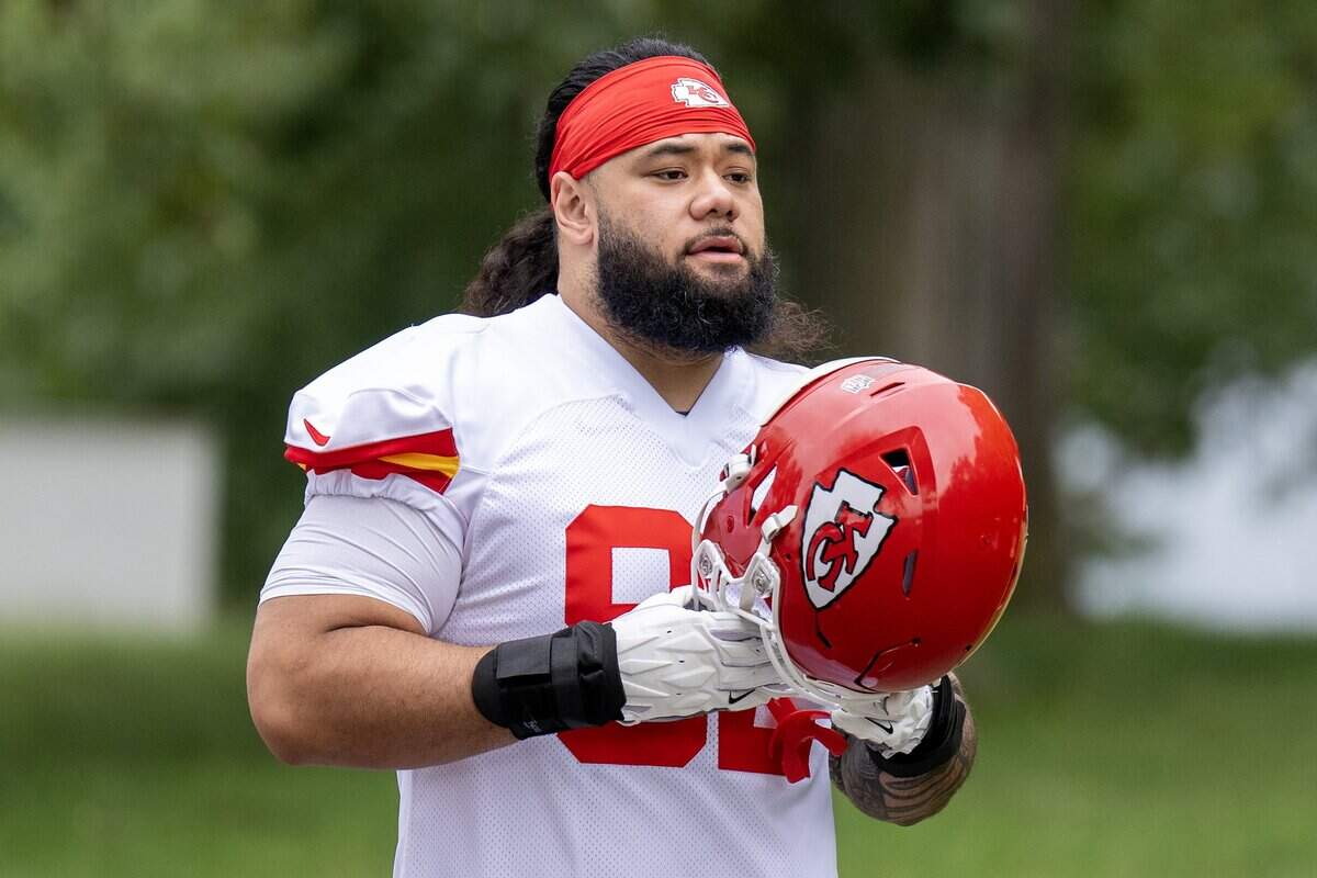 Kansas City Chiefs nose tackle Khyiris Tonga (92) walks down to the field for practice during Chiefs training camp on Thursday, July 30, 2026, in St. Joseph.