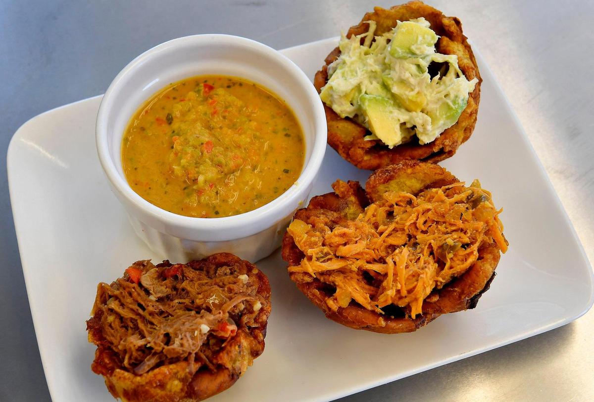 Cafe Sofrito’s stuffed twice-cooked plantains made with chicken, beef and avocado.