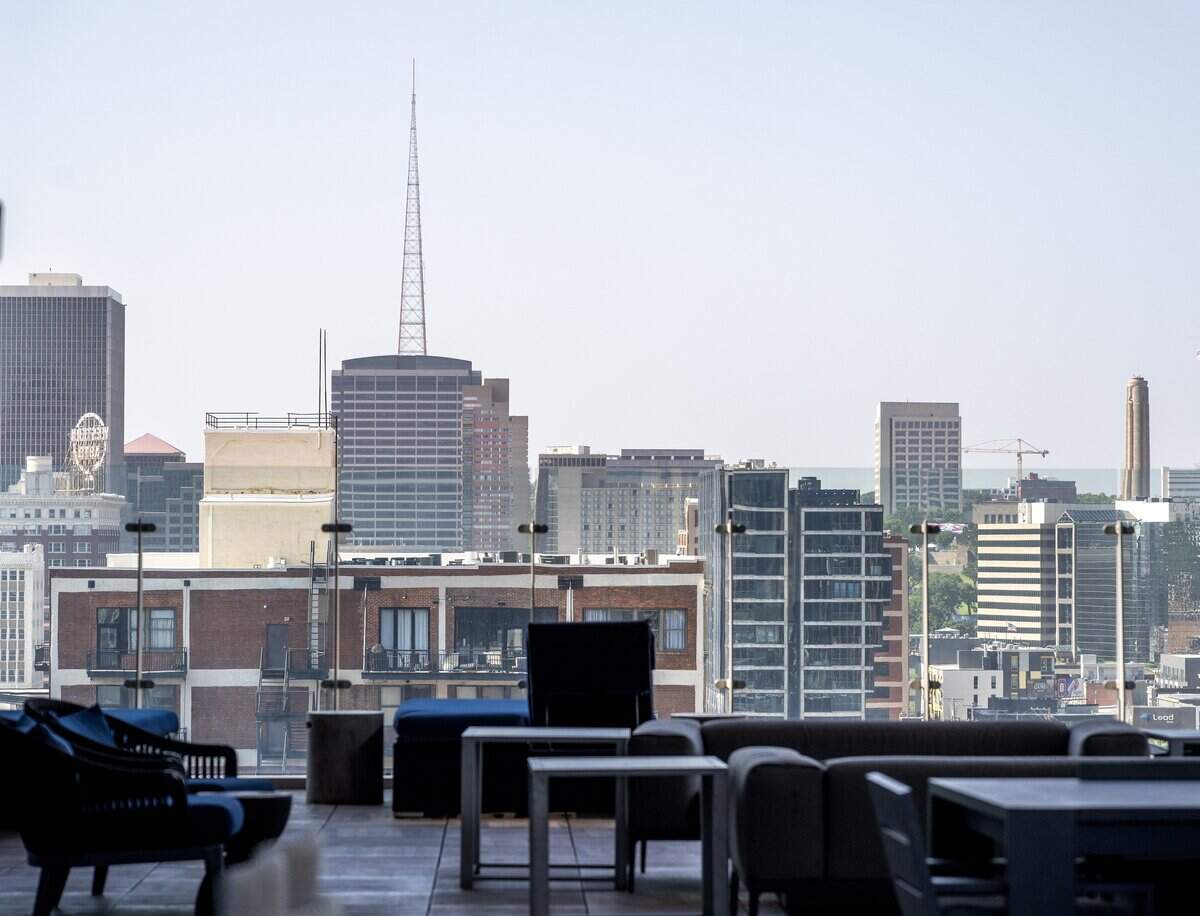 The Kansas City skyline is seen from the eighth-floor terrace at Two Light Luxury Apartments on Tuesday, June 30, 2026.