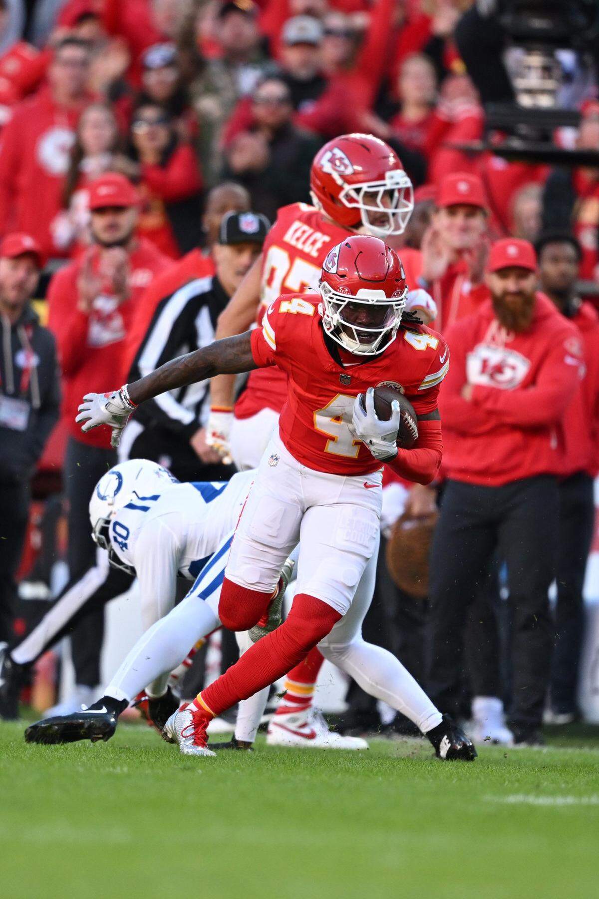 Chiefs wide receiver Rashee Rice (No. 4) runs with the ball after making a catch against the Indianapolis Colts during an NFL Week 12 game at GEHA Field at Arrowhead Stadium in Kansas City on Sunday, Nov. 23, 2025.