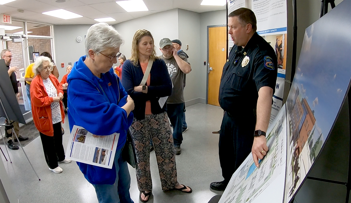Captain Nathan Mulch of the Liberty Police Department talks to a group of Liberty residents prior to conducting a tour of the department’s current facility. On April 8, Liberty voters will decide on a one-cent sales tax increase to support first responders. If approved, the tax would generate $7.5 million for salaries, a police facility expansion, and future equipment purchases.