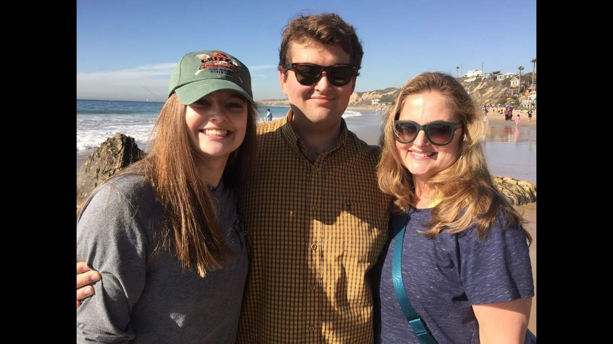 Sherry Kuehl, right, keeps her family vacations small. She’s pictured with her daughter, Bella, and son, Austin, in Newport Beach, California.