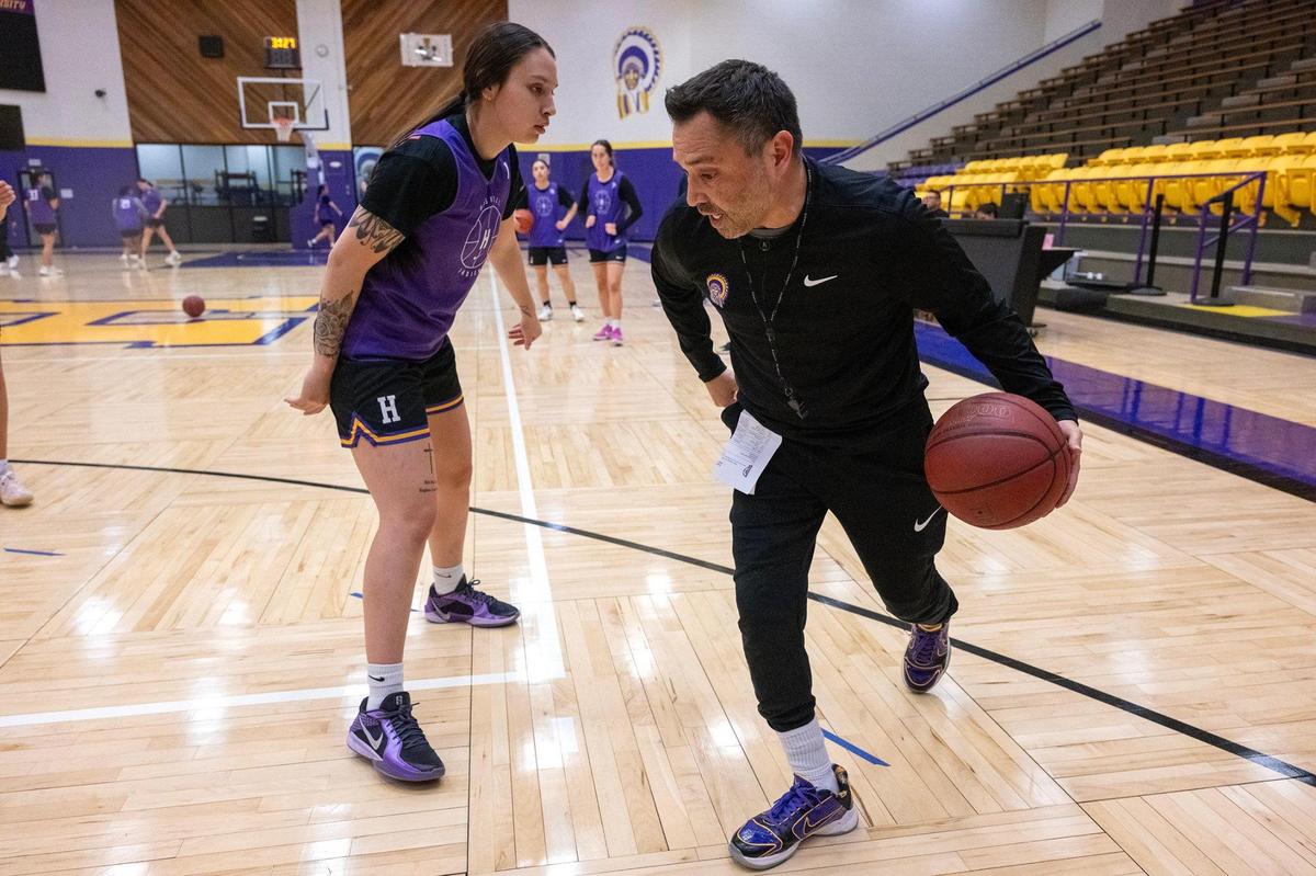 Myona Dauphinais, a junior shooting guard on the Haskell Indian Nations University women’s basketball team, is pictured on the court during practice with Adam Strom. Dauphinais is part of the Spirit Nation and is the team’s top scorer.