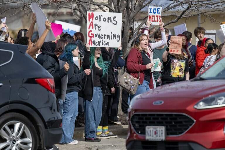 Johnson County teens protest ICE with student-led march | Kansas City Star