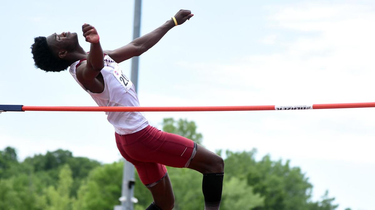 Lee’s Summit North junior Devon Richardson attempts to clear the bar during the Class 5 high jump at the Missouri track and field championships at Adkins Stadium in Jefferson City on Saturday.