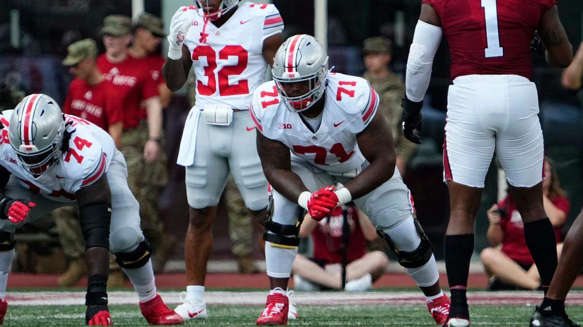 Ohio State Buckeyes offensive lineman Josh Simmons (71) lines up during the NCAA football game at Indiana University Memorial Stadium in 2023.
