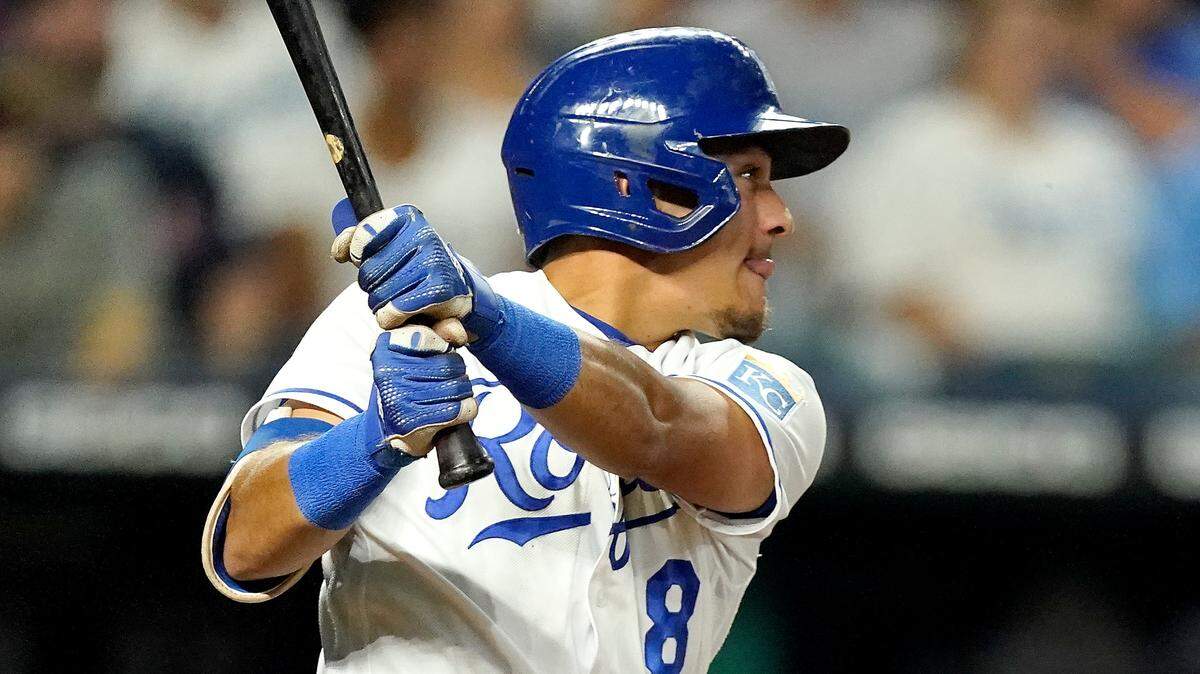 Kansas City Royals’ Nicky Lopez hits an RBI triple during the eighth inning of a baseball game against the Cleveland Indians Tuesday, Sept. 28, 2021, in Kansas City, Mo. (AP Photo/Charlie Riedel)