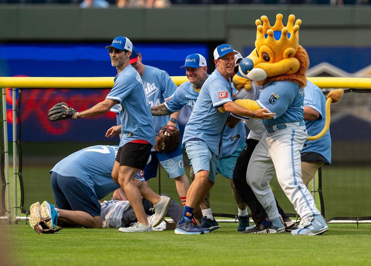 A brawl in the outfield during the Big Slick Celebrity Softball game on Friday, May 30, 2025, at Kauffman Stadium in Kansas City.