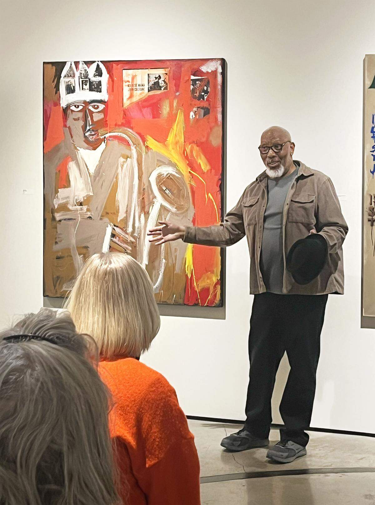 Artist Harold Smith seen speaking to crowd during the opening of his solo exhibition We Shall Not Be Moved opened at Sherry Leedy Contemporary Art.