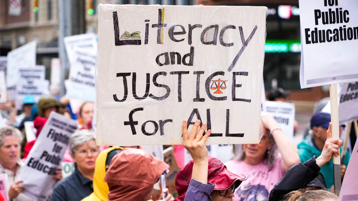 Protesters marched in support of public education and against the Trump administration outside the Ohio Statehouse on May 1.