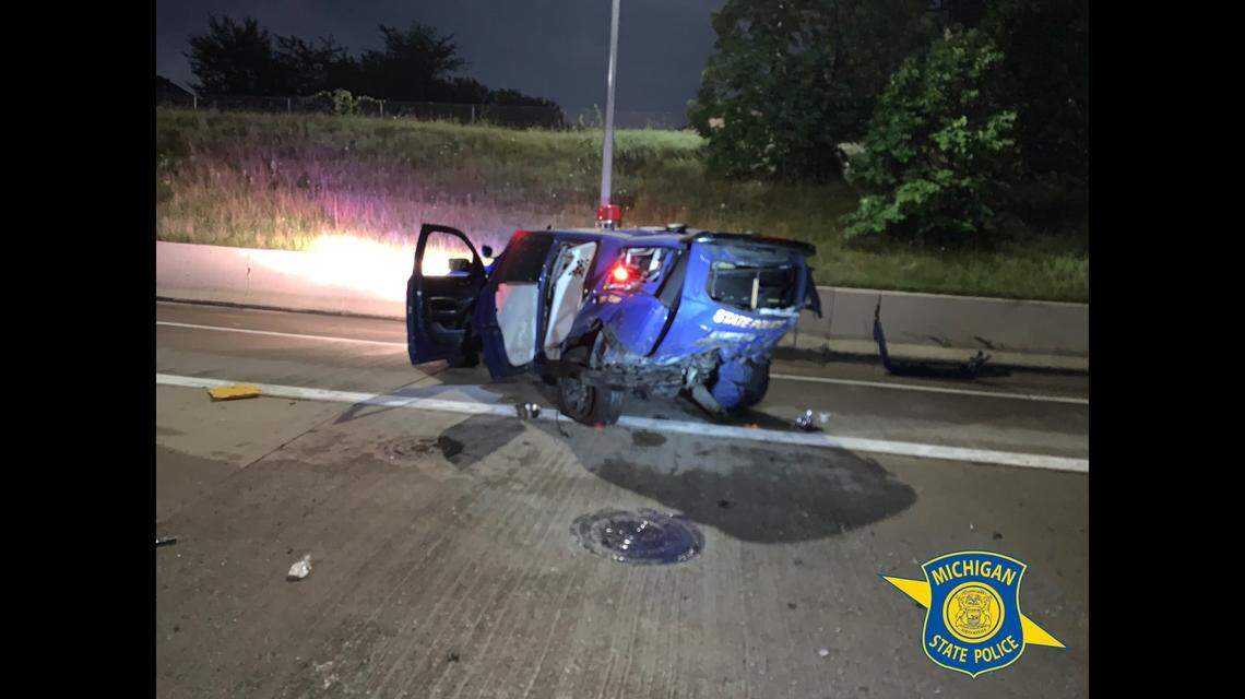 The Michigan State Police trooper involved in the crash told investigators the sedan that hit him was traveling at “freeway speed.”