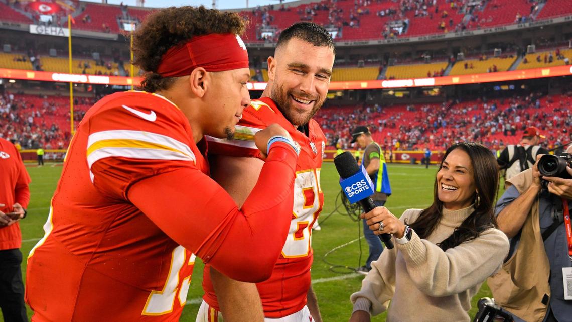 Kansas City Chiefs tight end Travis Kelce (87) laughs as quarterback Patrick Mahomes (15) interrupts a TV interview after defeating the Los Angeles Chargers 31-17 in an NFL football game at GEHA Field at Arrowhead Stadium on Monday, Oct. 23, 2023, in Kansas City.