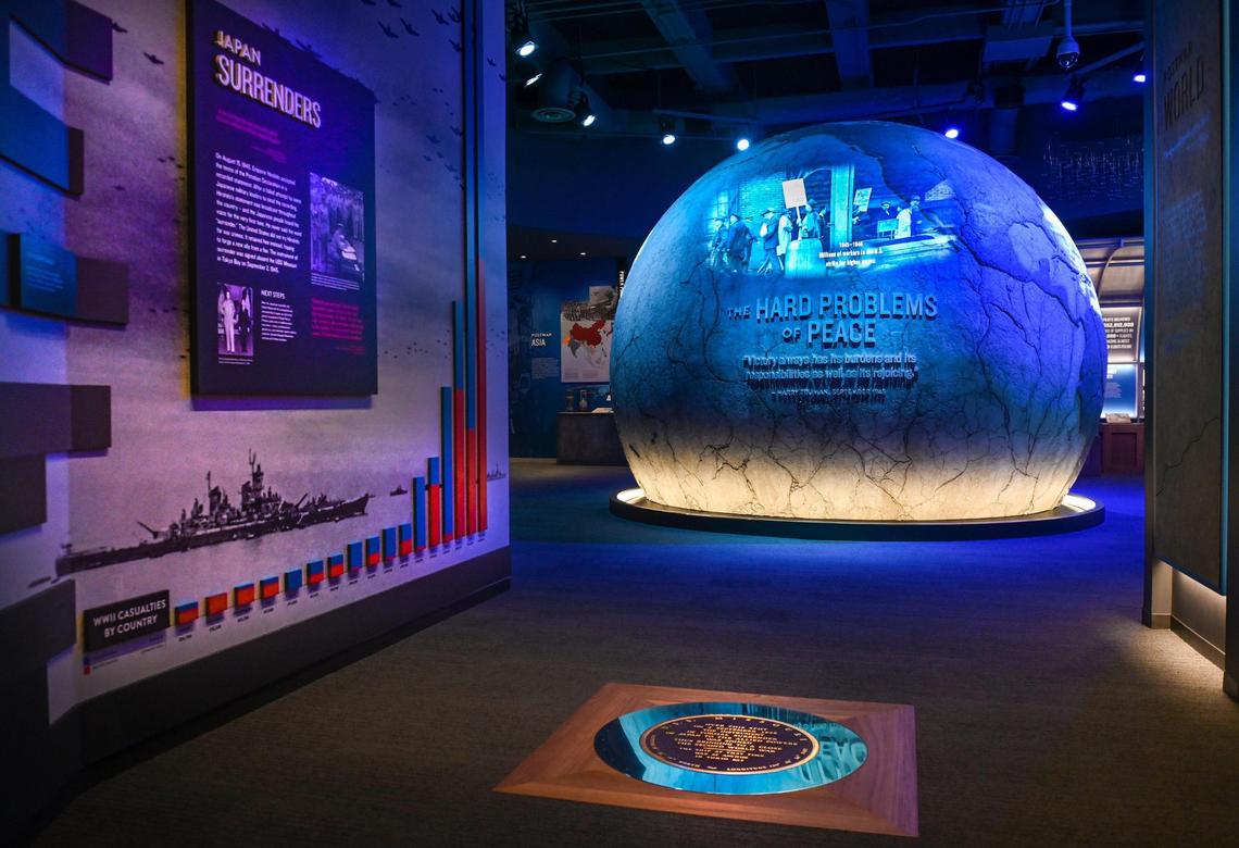 In the new exhibit The Hard Problems of Peace, historic video of post-World War II is shown on a fractured globe.