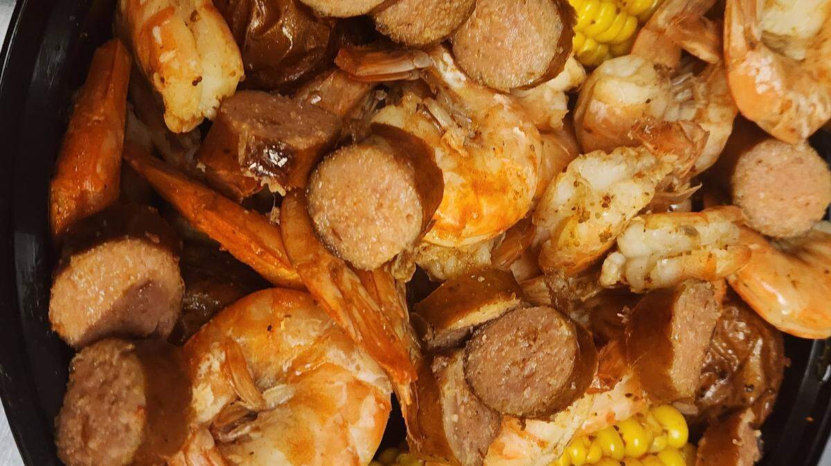 The Shrimp Feast at Bosslady’s Famous Shrimp includes shrimp, potatoes, corn and sausage, served in a bucket, for $35.