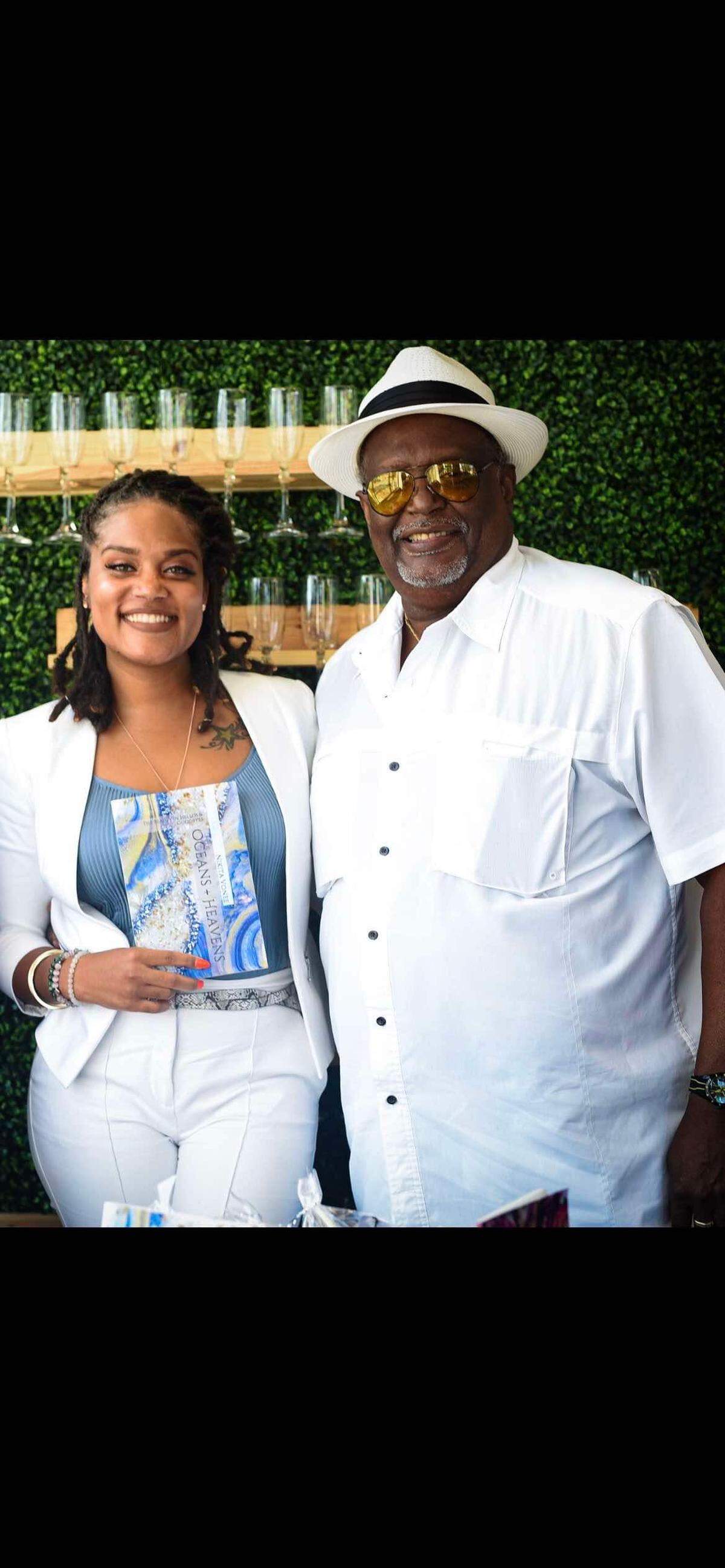 Nikita Vonee with father Normal Woodley.