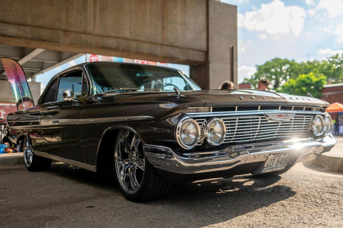 A vintage Chevrolet Impala was parked for visitors to check out as they shopped and enjoyed the First Friday atmosphere.