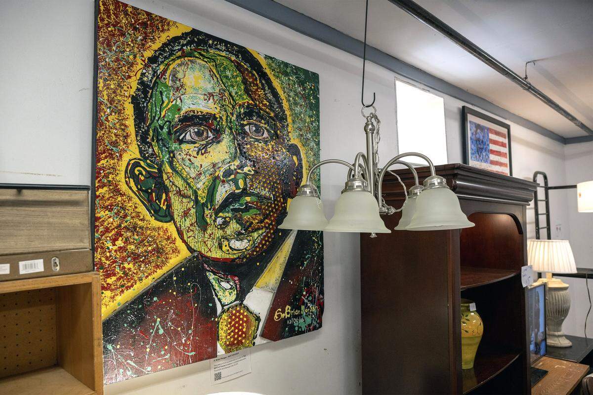 A portrait of former President Barrack Obama by artist S. Brian Morgan is on display at Troost39, a thrift store, on Thursday, Jan. 15 2026, in Kansas City. Morgan received a grant as part of The GIFT of Troost initiative in collaboration with Troost39 and Kansas City G.I.F.T.