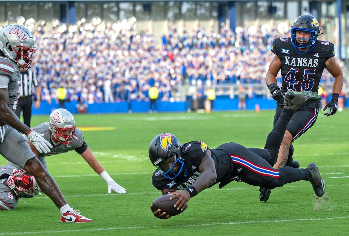 Kansas Jayhawks quarterback Jalon Daniels (6) dives for a touchdown against the UNLV Rebels in the first half on Friday, Sept. 13, 2024, at Children’s Mercy Park in Kansas City, Kansas.