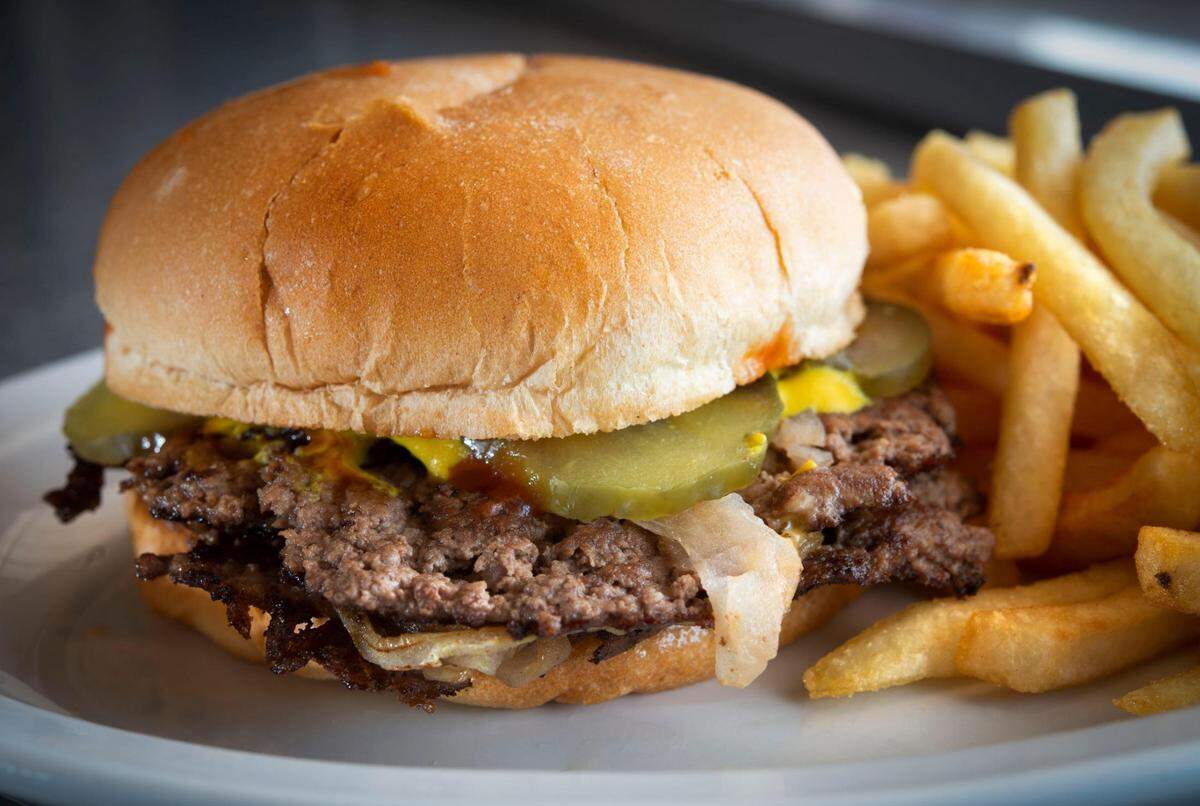 A double hamburger and fries at Town Topic, 2021 Broadway Blvd. The iconic restaurant, with two downtown locations, has been serving up hamburgers since 1937.