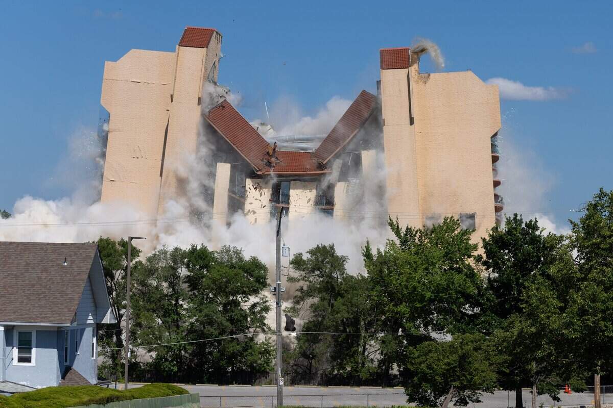 The former Embassy Suites building, owned by Saint Lukes Hospital implodes on Sunday, July 12, 2026. Saint Luke's plans to use the lot for staff parking while reserving it for future campus development.