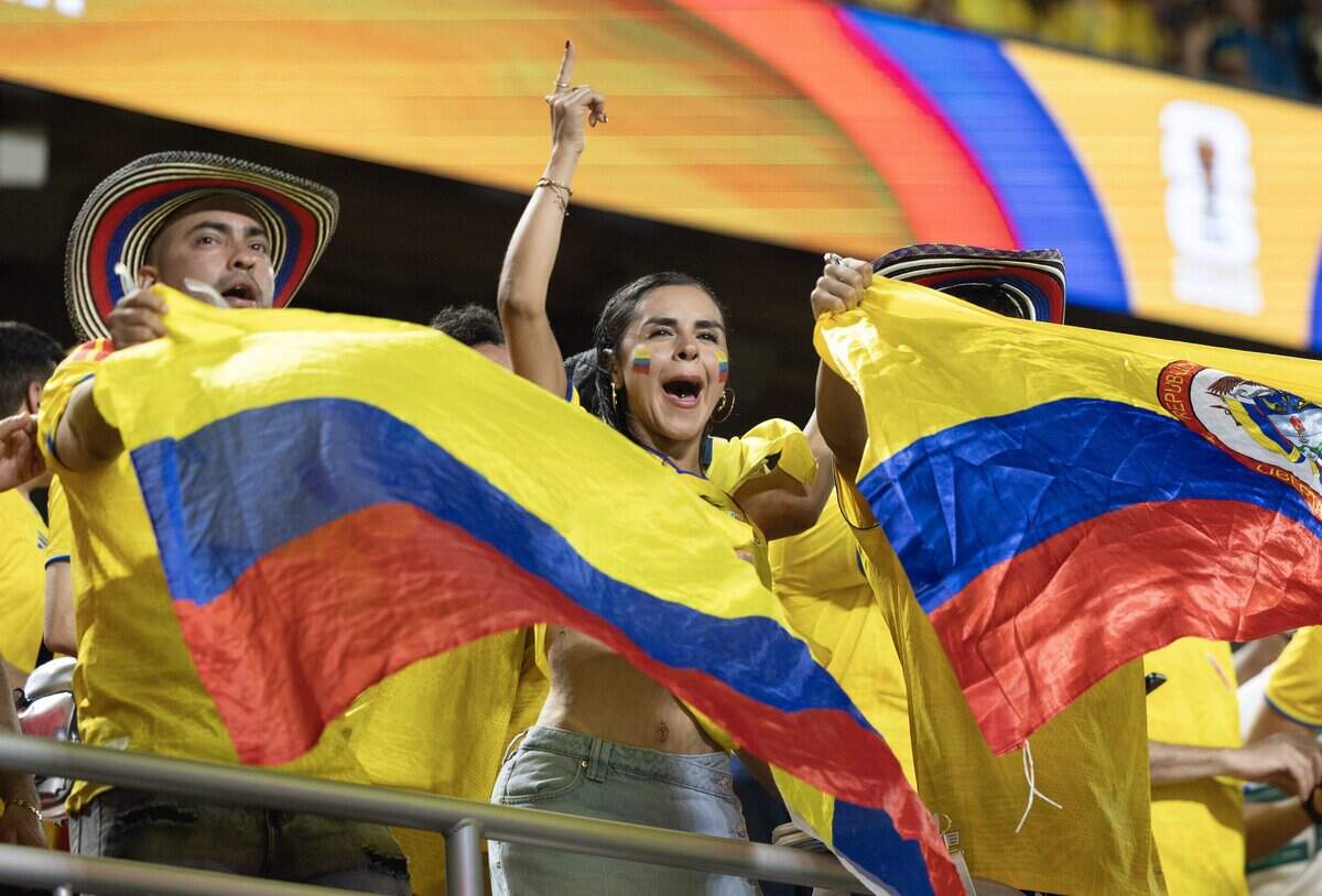 Colombia fans celebrate after their team defeated Ghana at a FIFA World Cup knockout stage soccer match at Kansas City (Arrowhead) Stadium in Kansas City on Friday, July 3, 2026.