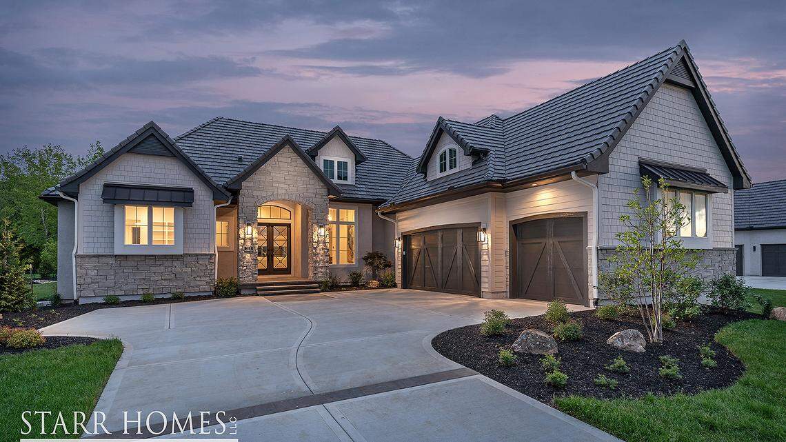 Starr Homes’ new entry (#111) offers coastal style and golf course views.