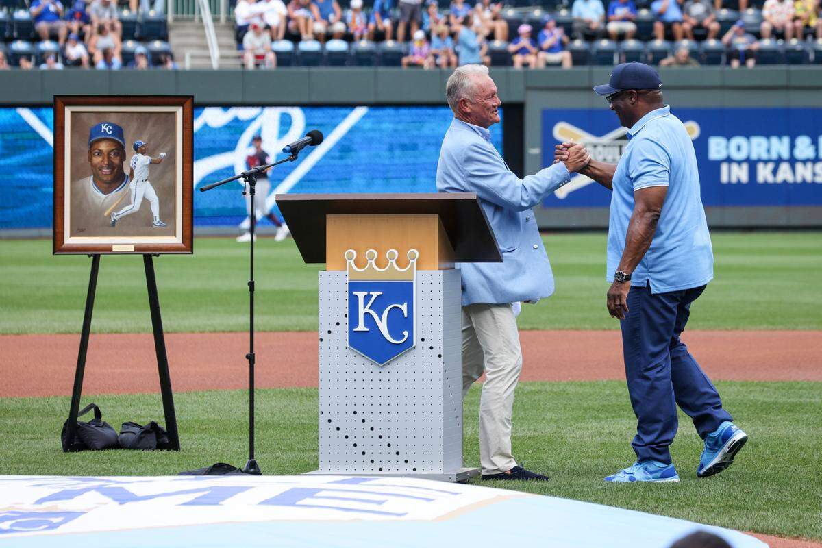Hall of Famer George Brett, left, congratulates Bo Jackson during Saturday’s pre-game Royals Hall of Fame induction ceremony at Kauffman Stadium.