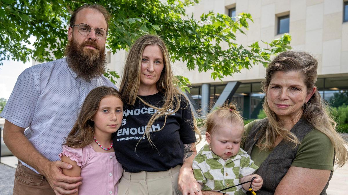 Brian Boxx with his wife, Sarah Goble, their son Finnik, her older daughter Sawyer and her mother, Kim Goble, outside the Johnson County Courthouse.