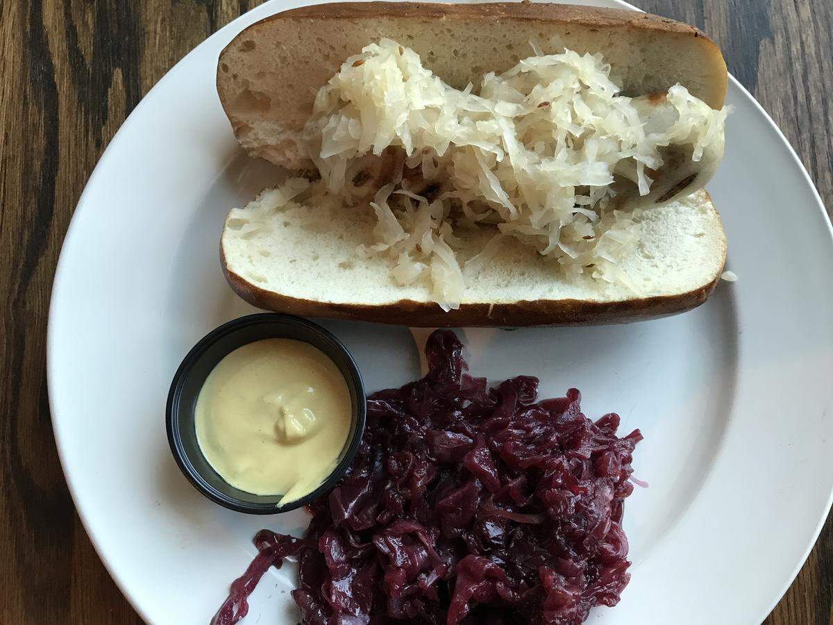 Ironhaus Biergarten & Bierhalle’s The Bronco Dog with Fritz’s smoked bratwurst, red cabbage and Düsseldorf mustard for $9.