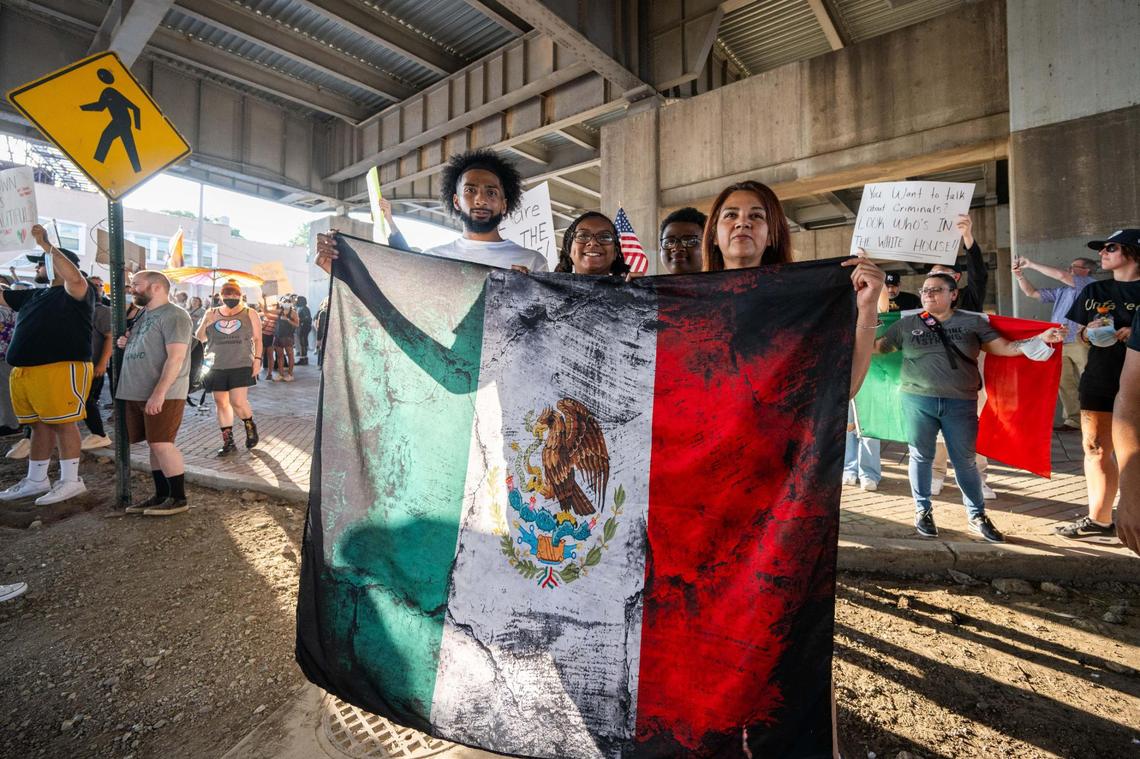 Several hundred people attended an Shut Down ICE protest on Kansas City’s Westside and downtown areas on Tuesday, June 10, 2025. People held signs and flags and chanted in support of immigrants being detained in Los Angeles and against the Trump administration’s immigration policies.