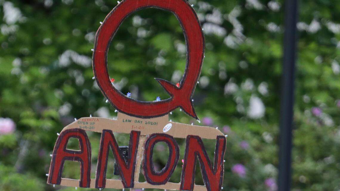 The daughter of a man in Walled Lake, Michigan, who shot his other daughter, killed his wife, attributed the violence to QAnon, online right-wing extremism.