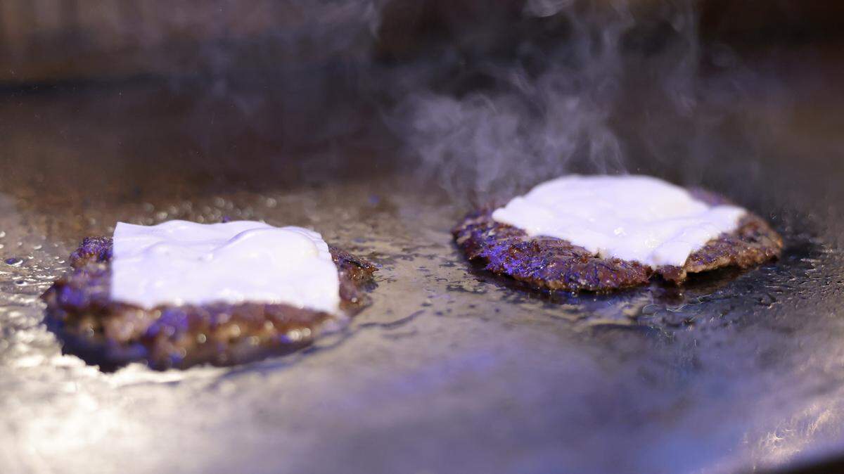 Cooking burgers.