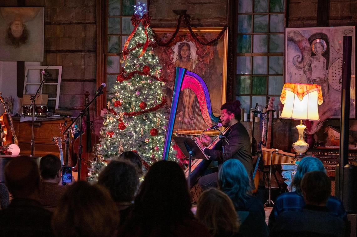 Calvin Arsenia performs at the Greenwood Social Hall. When he returned to Kansas City, he decided that he would use his music to challenge the stereotypes and misconceptions about the unique triangular-shaped instrument that straddles two musical worlds — string and percussion.