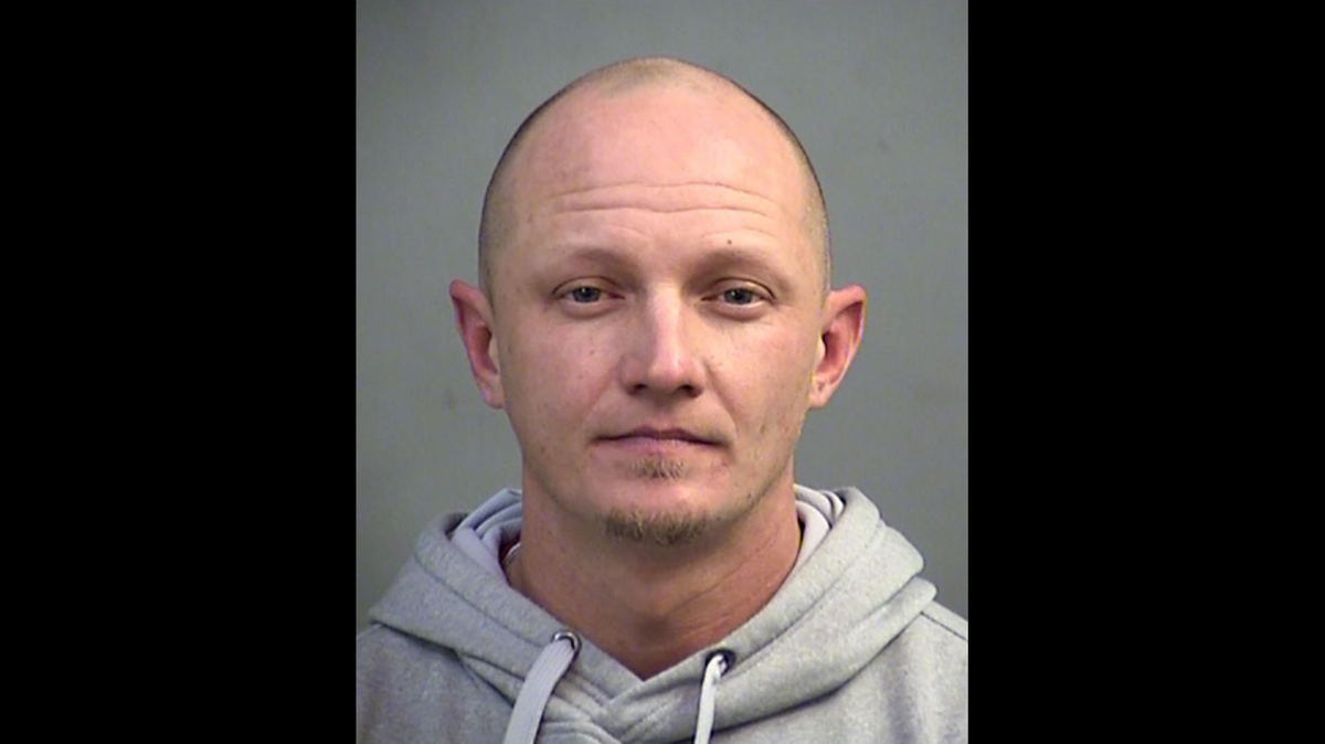 Timothy Hayes Jr., 37, was arrested after police say he handcuffed his teen son and left him in an Indiana jail.