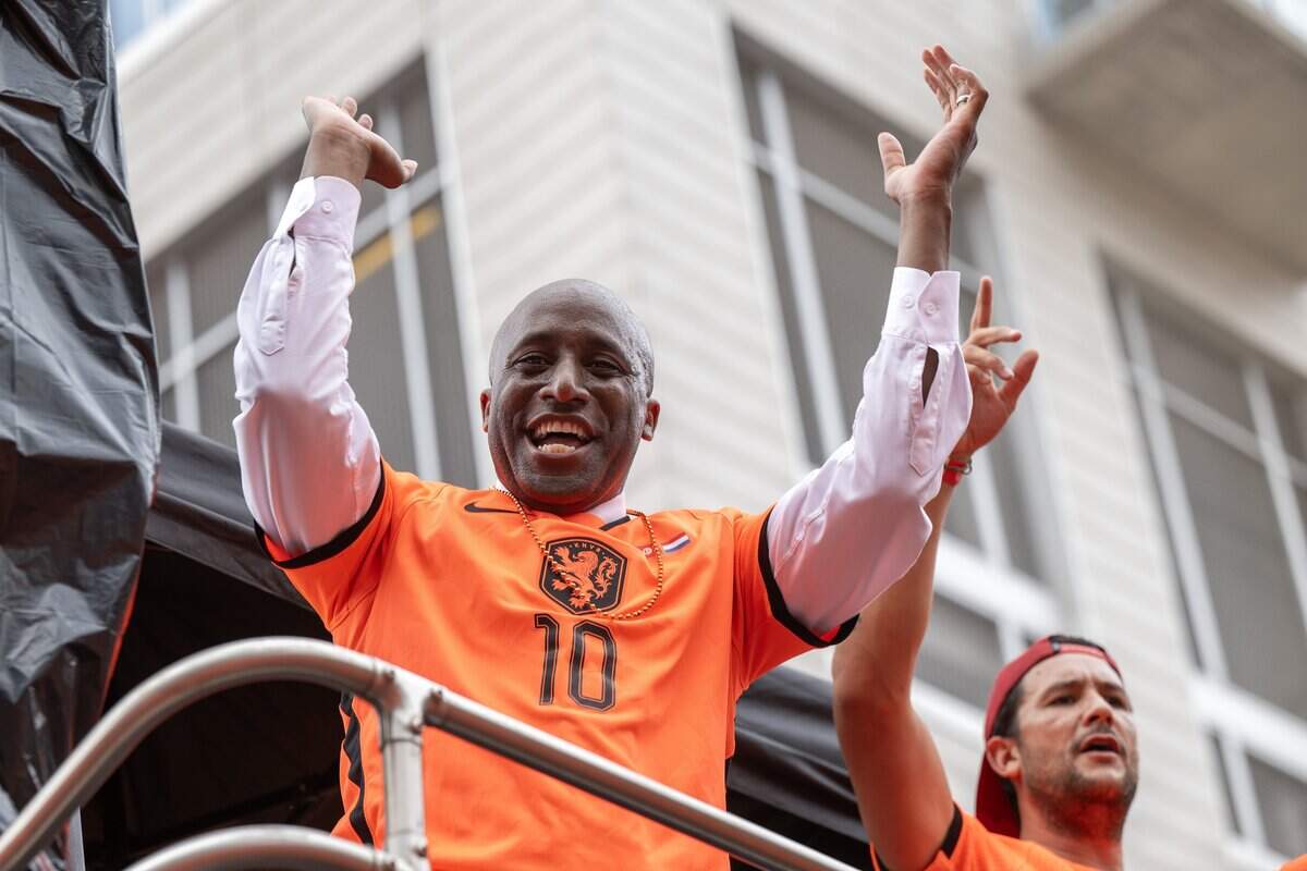 Kansas City Mayor Quinton Lucas rides aboard the Oranje bus as fans celebrate during the Orange Walk on Thursday, June 25, 2026, in Kansas City.