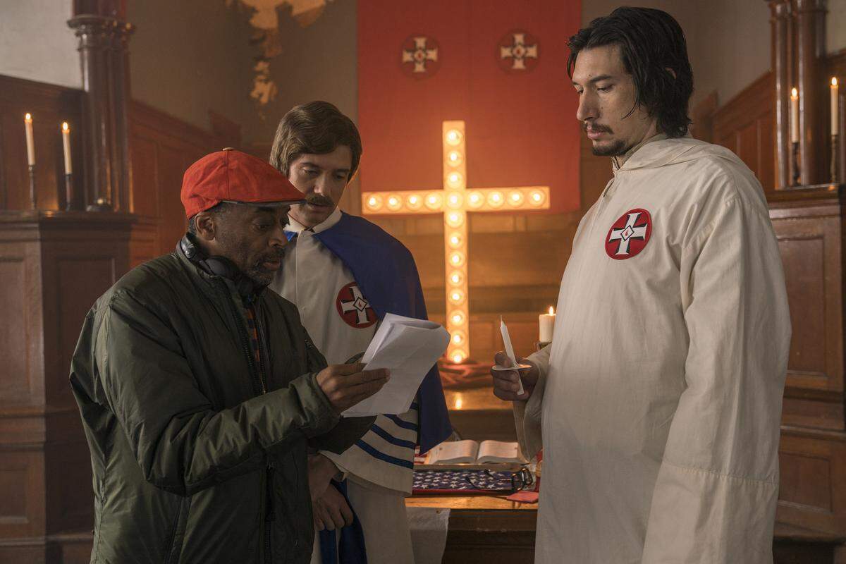 Director Spike Lee (from left) on the "BlacKkKlansman" set with Topher Grace, who plays KKK leader David Duke, and Adam Driver, who plays an undercover cop.