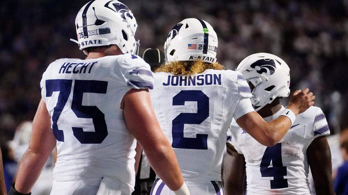 Kansas State Wildcats quarterback Avery Johnson (2) hypes up running back Joe Jackson (4) during the second half against the North Dakota Fighting Hawks at Bill Snyder Family Stadium on Aug. 30, 2025.