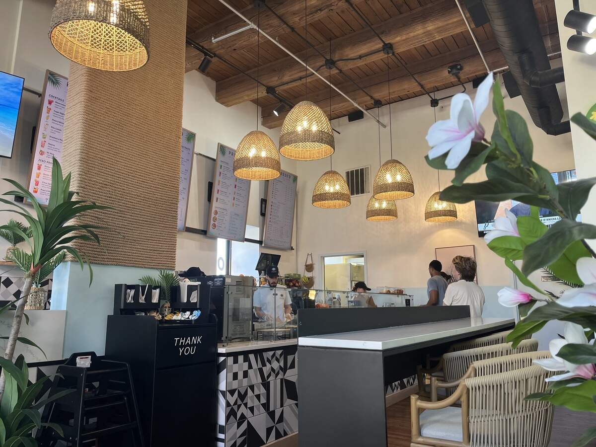 Inside Press’d, a tropical-themed cafe and lounge that opened in the River Market Friday. It features smoothies, cold-pressed juices, sandwiches, coffee and more.