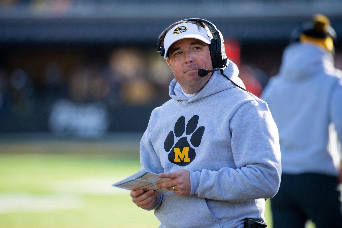 Missouri head coach Eliah Drinkwitz watches during the first quarter of an NCAA college football game against South Carolina, Saturday, Nov. 13, 2021, in Columbia, Mo. Missouri won 31-28. (AP Photo/L.G. Patterson)